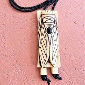 Vintage 1980's Diane von Fürstenberg Faux Bone Scarab Pendant on Cotton Cord